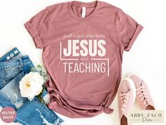 Just a girl who loves Jesus and teaching. Every day is a great day when it includes Jesus and teaching! This Christian teacher shirt is printed on soft and comfy Bella and Canvas brand shirts so you never have to sacrifice comfort or style. More of our Christian shirts for women can be found at our homepage. https://www.etsy.com/shop/AbbyZachDesigns ----HOW OUR SHIRTS ARE MADE ----  * We use the process of DTG, which stands for direct to garment printing. We partner with a professional printer w Christian School Teacher Gifts, Private Christian School, Christian Shirts For Women, Class Shirt, School Teacher Gifts, Christian School, Cute Shirt Designs, Teacher Outfit, Brand Shirts