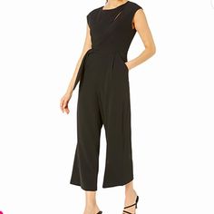 Calvin Klein Jumpsuit With Keyhole & Knotted Side Detail Black 12 Fitted Calvin Klein Jumpsuits And Rompers For Party, Spring Chic Calvin Klein Jumpsuits And Rompers, Calvin Klein Summer Workwear Jumpsuits And Rompers, Calvin Klein Summer Jumpsuits And Rompers For Work, Chic Calvin Klein Jumpsuits And Rompers For Summer, Chic Calvin Klein Summer Jumpsuits And Rompers, Calvin Klein Fitted Workwear Jumpsuits And Rompers, Calvin Klein Fitted Jumpsuits For Work, Calvin Klein Fitted Jumpsuits And Rompers For Work