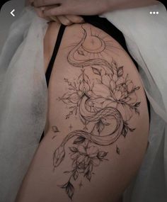 a woman's stomach with flowers on it