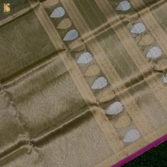 Khinkhwab brings you an exclusive Saree range- specially crafted for Khinkhwab by our weavers for the festive season. This is an exclusive limited edition in Silk and tissue fabrics with an elaborately crafted zari border. The combination of both silk and tissue fabrics makes it a stunning piece. A must buy saree for the festive season. Fabric: Silk by Tissue Weave- Banarasi Golden and silver zari work with zari border. Blouse- Plain with zari border Note- There may be slight color variations du Tussar Silk Traditional Wear With Pallu For Celebration, Raw Silk Saree With Cutdana For Celebration, Celebration Raw Silk Saree With Cutdana, Celebration Cutdana Saree In Raw Silk, Festival Celebration Tissue Silk Dupatta, Tussar Silk Traditional Wear With Cutdana For Celebration, Traditional Tussar Silk Saree For Celebrations, Celebratory Tussar Silk Traditional Wear With Cutdana, Tissue Silk Dupatta For Festivals And Celebrations