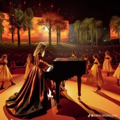 a woman sitting at a piano in front of other women on stage with trees and lights behind her