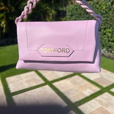 2022 Season Tom Ford Chain-Link Handle Bag With Detachable Strap Lilac Leather Gold Tonal Hardware Chain-Link Accents Leather Lining With Card Slots Snap Closure At Front Includes Dust Bag & Tags/Cards Handle Drop: 3.5" Height: 4.5" Width: 8" Depth: 2.75" This Item Shows No Visible Signs Of Wear. Chic Clutch With Branded Hardware, Leather Clutch With Chain Strap For Shopping, Luxury Clutch With Chain Strap For Shopping, Purple Rectangular Bags With Chain Strap, Luxury Purple Shoulder Bag With Chain Strap, Pink Rectangular Chain Bag, Pink Rectangular Bag With Silver-tone Hardware, Luxury Purple Bag With Branded Hardware, Tom Ford Bags 2022