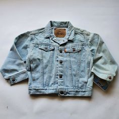 Little Levis Deadstock USA Made Orange Tab Light Wash Kids 6 Vintage Jacket. Shipped with USPS Priority Mail. The left arm on this jacket is faded and part of the shoulder Tag is dated 1991 No holes Orange tab USA Made Vintage Jackets 90s, Vintage Jacket, Priority Mail, Denim Jacket, Orange