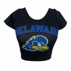 This super flattering University of Delaware Cropped and Fitted Tee is perfect for college game day paired with our Black Biker Shorts! Our Delaware Babydoll Tee's stretchy fabric makes it the perfect option for all body types. Stretchy and soft, you'll want to rock this top every day! Go Blue Hens! In stock & ships in 1-2 business days. One Size Fits Most. 88% Micropoly, 12% Spandex. Stretch Fit. Sublimated Design. Machine wash on cold. Officially Licensed by Lo + Jo Bands. Sporty Blue Tops For Cheerleading, Collegiate Blue Tops For Cheerleading, Black Stretch Activewear For Cheerleading, Blue Short Sleeve Top For Cheerleading, Cotton Stretch Tops With Team Spirit Style, Stretch Cotton Tops With Team Spirit Style, Fitted Black Collegiate Tops, Cotton Stretch Tops For Team Spirit, Stretch Cotton Tops For Team Spirit