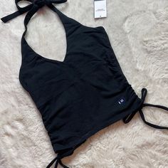 Nwt Hollister Halter Top - Size: Xs Smoke Free | Offers Accepted New To Poshmark? Use Referral Code Justfoxii When You Sign Up For Poshmark And Get $10 Posh Credit! Fitted Cotton Halter Top With Built-in Bra, Workout Top With Built-in Bra, Triangle Shape, Summer Racerback Tops For Night Out, Fitted Triangle Halter Top For Workout, Black Cotton Halter Neck Top, Summer Workout Halter Neck Tops, Sporty Fitted Triangle Crop Top, Casual Racerback Halter Top For Night Out, Fitted Sporty Black Halter Top