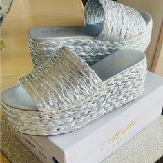 Mata Rafia Platform Sandals . New In Box/ Never Worn . Ladies Size 7 Casual Silver Heels For Beach, Silver Synthetic Heels For Summer, Silver Round Toe Sandals For Summer, Party Wedge Sandals With Woven Sole, Silver Round Toe Summer Sandals, Party Sandals With Woven Wedge Heel, Silver Slip-on Wedge Sandals For Spring, Silver Open Toe Sandals For Beach Season, Silver Slip-on Heels For Summer