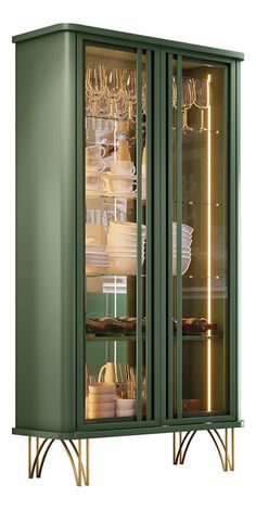 a green cabinet filled with lots of dishes and wine glasses on top of metal legs