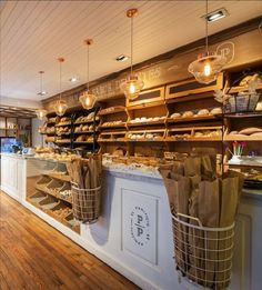 a bakery filled with lots of bread and muffins