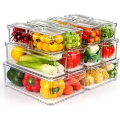 several plastic containers filled with different types of fruits and vegetables