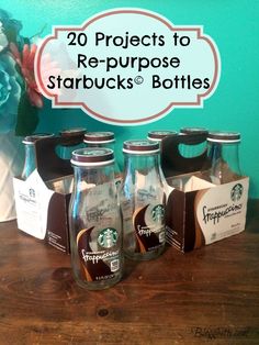 there are six starbucks bottles on the table and one is labeled 20 projects to re - purpose starbucks's bottled beverages