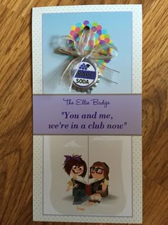 a card with two cartoon characters on it and an ad for the book baby you and me, we're in a club now