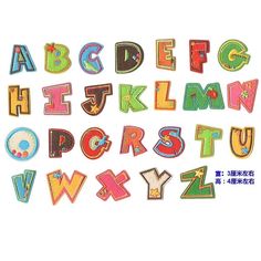 the letters and numbers are made out of felts with different designs on them, including one