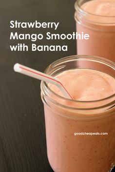 two mason jars filled with smoothies on top of a table