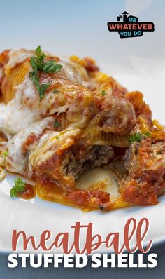 meatball stuffed shells on a white plate with the words meatball stuffed shells over it