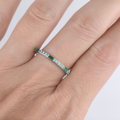 This is a lab created green emerald and cubic zircon ring in 925 sterling silver. This ring is marked S925 Sapphire ring: www.etsy.com/listing/928146348/half-eternity-sapphire-wedding-ring-blue?ga_search_query=sapphire&ref=shop_items_search_12&crt=1 I accept custom making order.Please contact me if you need this service. This ring is closed ring.If you want a matching band,you can ask me custom make it. For all the jewelries,there is a 14 days money back guarantee.You can return it in th Green Diamond Channel Set Rings, Green Eternity Band With Prong Setting As Gift, Fine Jewelry Green Channel Set Ring, Green Cubic Zirconia Half Eternity Jewelry, Green Emerald Round Cut Eternity Band, Anniversary Green Channel Set Rings, Green Diamond Stackable Rings For Anniversary, Emerald Ring Channel Set As Gift, Gift Emerald Ring Channel Set Fine Jewelry