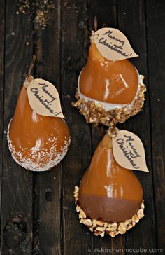 three pears are sitting on top of each other with the words happy birthday written on them