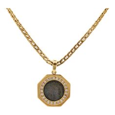 This is part of Chairish’s Fine Jewelry assortment.  Gender: Unisex  Metal Type: 18K Yellow Gold  Chain Length: 16.00 inches  Chain Width: 4.10 mm  Pendant Diameter: 28.00 mm  Pendant Weight: 14.12 Grams  Chain Weight: 25.94 Grams  18K yellow gold diamond vintage coin, halo pendant. The metal was tested and determined to be 18K yellow gold.  18K yellow gold vintage flat razor link chain. The metal was tested and determined to be 18K yellow gold. Engraved with "750".  Vintage in very good condition. Signs of wear are consistent with age.  Pavé set in 18 Karat Yellow Gold with:  Twenty-four (24) round brilliant cut natural diamonds:  Measurements: 1.75mm - 2.00mm in diameter x ~1.14mm in depth. Weight Range: 0.021 ct. - 0.030 ct. Estimated Total Weight: 0.620 ct. Color: I - J Clarity: VS2 - Elegant Formal Coin Necklace With Round Pendant, Elegant Formal Coin Pendant Necklace, Elegant Formal Coin Necklace With Pendant, Elegant Round Pendant Coin Necklace For Formal Occasions, Elegant Gold Coin Necklace For Formal Occasions, Elegant Gold Coin Necklace For Formal Events, Antique Coin Pendant Necklace For Formal Occasions, Formal Jewelry With Round Pendant Box Chain, Luxury Coin Pendant Necklace For Formal Occasions