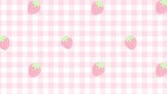 a pink and white checkered background with strawberries