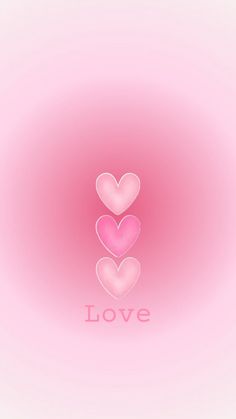 two pink hearts with the word love written on them in front of a light pink background