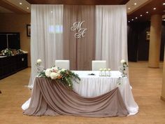 the table is set up for a wedding reception