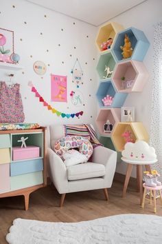 a child's room with colorful shelves and furniture