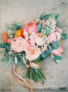 a bouquet of flowers sitting on top of a table