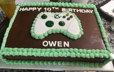 a birthday cake with a video game controller on it