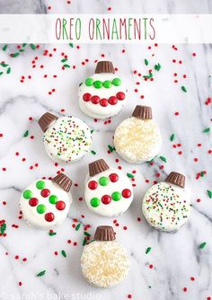 these oreo ornaments are decorated with white chocolate and sprinkles on top