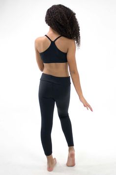 These girls' high-performance microfiber pants are made with a technical fabric that's soft and sturdy. It sits at a generous mid-to-high rise. Make it a complete outfit by pairing the pants with our microfiber racerback bra top! Fabric: Nylon, SpandexStyle: BM6382GSize: 4/5, 6/7, 8/10, 12/14Color: Black For wholesale inquiries, please call us at (626) 336-2111 or email us! Hot Shorts, Racerback Bra, Girls High, Complete Outfits, Bra Top, Arabesque, These Girls, Dance Wear, Bra Tops