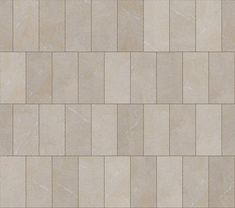 an image of a tile wall that looks like it is made out of beige tiles