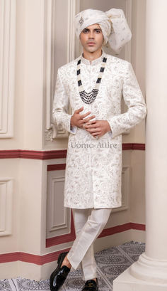 white sherwani Sherwani Design, White Sherwani, Sherwani For Groom, Sherwani Groom, Traditional Indian Wedding, Indian Weddings, Groom Attire, Intricate Embroidery, Traditional Indian