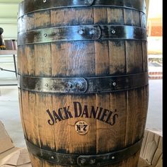 a wooden barrel sitting on top of a table