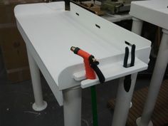 King-Starboard-Fish-Cleaning-Station 1/2" thick table for $299.99!! Made from King Starboard 20" deep x 44" long x 40" high. Equip with 2 knife holders - One garden hose holder - one plier bracket. Ruler engraved into table surface to measure fish. Boathouse Ideas, Boat Table, Wash Station, Garden Hose Holder, Lake Ideas