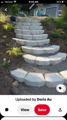 there is a set of stone steps in the yard