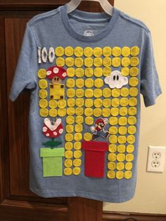 a t - shirt that has been made to look like mario's game on it