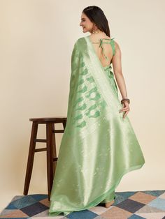 Elevate your ethnic wardrobe with our captivating green zari weaving banarasi silk function wear saree. This stunning saree is crafted from high-quality banarasi silk material, known for its luxurious texture and comfortable drape. The saree features intricate zari weaving work that adds a touch of elegance and sophistication to your look. Pair it with the matching banarasi silk blouse that also boasts the same zari weaving work for a coordinated and chic ensemble.
The saree measures 5.50 meters Green Banarasi Silk Saree With Meenakari, Green Meenakari Saree, Green Meenakari Saree For Eid, Eid Green Meenakari Saree, Green Tussar Silk Saree With Meenakari, Green Meenakari Tussar Silk Saree, Green Banarasi Silk Dupatta With Meenakari, Green Meenakari Saree For Diwali, Green Banarasi Silk Traditional Wear With Zari Weaving