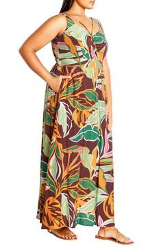 Complete your vacation packing with a lightweight maxi sassed with a center cutout and covered in showy blooms. 50" center back length (size X-Small) V-neck Adjustable straps Side-seam pockets Lined 80% viscose, 20% nylon Hand wash, dry flat Imported Vacation Packing, City Chic, Floral Maxi, Nordstrom Dresses, Floral Maxi Dress, Adjustable Straps, Top Brands, Hand Wash, Nordstrom