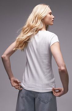 Lettuce edging at the scooped neckline sweetens this soft and stretchy pointelle-knit T-shirt. 23 1/2" length (size Medium) Scoop neck Short sleeves 95% cotton, 5% elastane Machine wash, dry flat Imported Casual Pointelle Knit T-shirt For Spring, Casual Pointelle Knit T-shirt For Summer, Relaxed Fit V-neck Pointelle Knit Top, White Scoop Neck Top For Layering, Spring Short Sleeve Top With Ribbed Crew Neck, Scoop Neck Cotton Short Sleeve Top For Spring, Stretch Pointelle Knit Short Sleeve Top, Spring Cotton Ribbed Short Sleeve Top, Spring Ribbed Cotton Short Sleeve Top