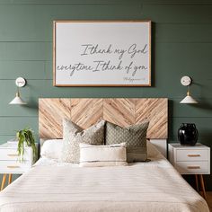 a bedroom with green walls and white bedding has a wooden headboard that says, thank my god everyone thinks about you