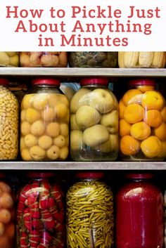 jars filled with fruit and vegetables sitting on top of shelves