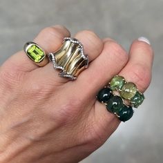 Take your pick! This epic pinky ring comes in alluring citrine and illuminating peridot. These emerald cut stones will create so much warmth and sparkle in your stacks. 14k yellow gold Available in emerald, or citrine, or peridot, or amethyst Measures approximately 12mm wide By Charlie and Marcelle Luxury Green Sapphire Ring With Accent Stones, Luxury Green Rings With Gemstone Accents, Luxury Green Sapphire Ring With Gemstone Accents, Luxury Peridot Multi-stone Rings, Luxury Multi-stone Peridot Ring, Luxury Green Topaz Gemstone Ring, Green Emerald Cut Multi-stone Diamond Ring, Emerald Cut Green Multi-stone Diamond Ring, Emerald Cut Green Diamond Ring With Multi-stone