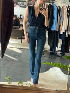 A high five for the super high rise 11.5" bootcut jeans. The retro-inspired style of Woodside gives the Valentina a slimming, rich, dark blue indigo and the stretch gives this denim a well-fitted silhouette. (Gentle fading and whiskering plus Favorite Daughter embroidery on the back waistband, of course.)These jeans have a 11.5" Rise & a 34" Inseam98% COTTON, 2% ELASTANEAdrianna is 5'9" wearing size 2511.5" Rise34" Inseam Bootcut Jeans Outfit Summer, Bootcut Jeans Outfit, Outfits Night Out, Jeans Outfit Women, Jeans Outfit Summer, Favorite Daughter, High Five, Night Outfits, Ladies Day