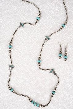 This fun necklace is great for layering! Beaded Turquoise Metal Jewelry, Turquoise Dangle Necklace Nickel Free, Turquoise Dangle Nickel-free Necklace, Turquoise Beaded Metal Jewelry, Nickel-free Turquoise Costume Jewelry, Nickel Free Blue Southwestern Jewelry, Sterling Silver Turquoise Jewelry With Lobster Clasp, Southwestern Nickel-free Turquoise Jewelry, Southwestern Turquoise Nickel-free Jewelry