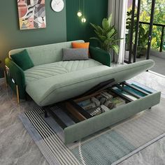 a living room filled with furniture and a green couch sitting on top of a rug