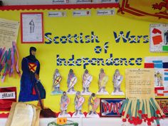 a bulletin board with paper cutouts on it that says scottish wars of indebidence