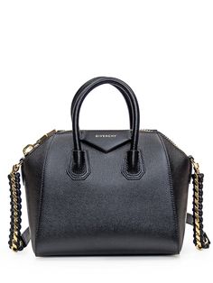 Black Antigona Mini bag in grained leather. Two handles. Removable leather and chain shoulder strap. Inside zipper pocket. Zipper closure. Signature GIVENCHY Logo on front. Width:22 Height:20 Depth:14Gender: WomenMaterial: OUTSIDE:100% CALFSKINColor: BlackMade in: ITProduct ID: BB50YHB20R 001*Import tax/duty will be calculated at checkout (If applicable) High-end Evening Bags With Zipper Closure, High-end Evening Bags With Zipper, Designer Evening Satchel With Chain Strap, Luxury Satchel Clutch With Chain Strap, Leather Satchel With Chain Strap And Double Handle, Luxury Chain Strap Satchel For Office, Luxury Office Satchel With Chain Strap, Luxury Satchel With Chain Strap And Top Handle, Evening Satchel With Chain Strap And Double Handle