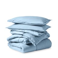 four pillows stacked on top of each other