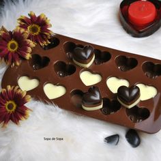 a chocolate tray with hearts and flowers on it