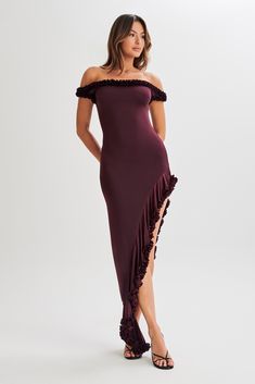 All ruffled up.Step into sophistication with the ARIELLE Off Shoulder Ruffle Midi Dress, a stunning blend of elegance and charm. With its off-the-shoulder design and asymmetrical hem, this dress exudes contemporary sophistication. The frill hem adds a playful and dynamic touch, while the flower appliqué neckline and hem bring a delicate and feminine flair. Designed with a bodycon silhouette, it offers a flattering fit for any occasion. Elevate your ensemble with the Arielle Off Shoulder Ruffle M Arielle Dress, Crop Top Dress, Ruffle Midi Dress, Crepe Dress, Women Clothing Boutique, Asymmetrical Hem, Jersey Dress, Boutique Clothing, Knit Dress