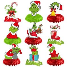 the grino christmas decorations are on display in red and green skirts, hats, and candy canes